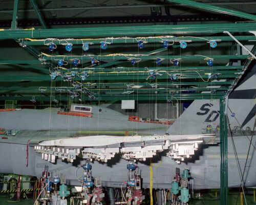 F-18 wing outfitted with a full suite of SpaceAge Control displacement sensors to monitor aircraft motion.