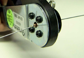 crimping the copper sleeve to the displacement cable