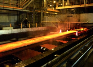 Figures C1, C2 - Temperature extremes in foundries make the environment inhospitable for some sensor types.  SpaceAge Control position transducers with broad temperature ranges and stainless steel cable are well-suited to this hostile location.