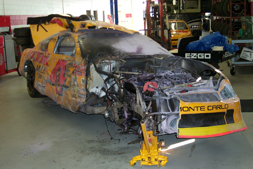 The vehicle in post-crash, post-fire condition